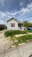 featured image of 114 E 9th St