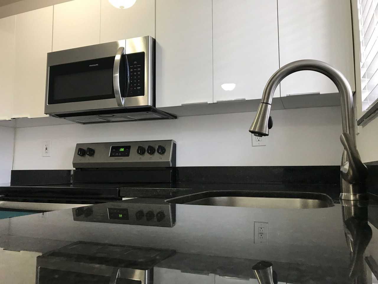 New Colony Apartments - Photo 4 of 9