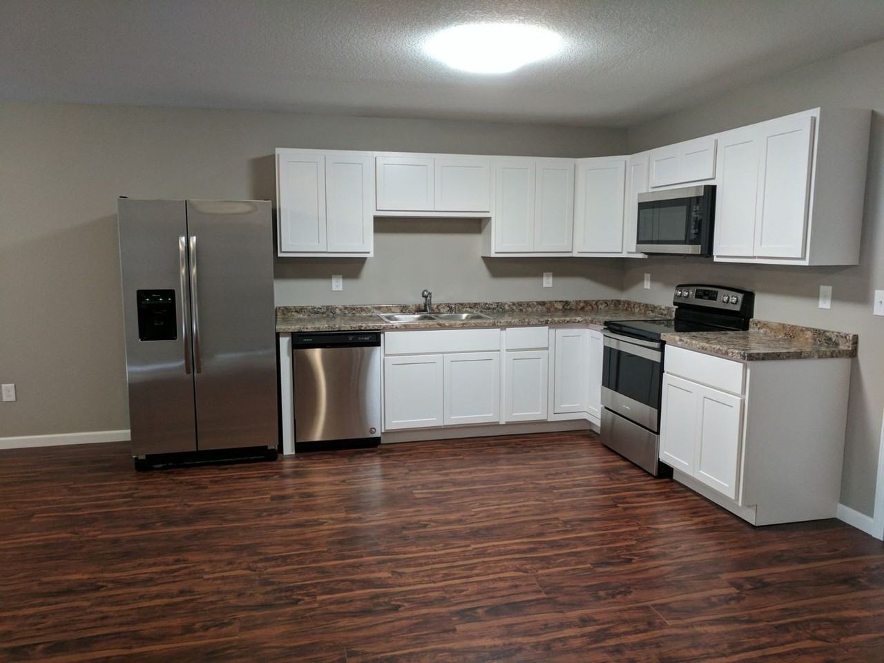 Rosewood Apartments - Photo 2 of 19