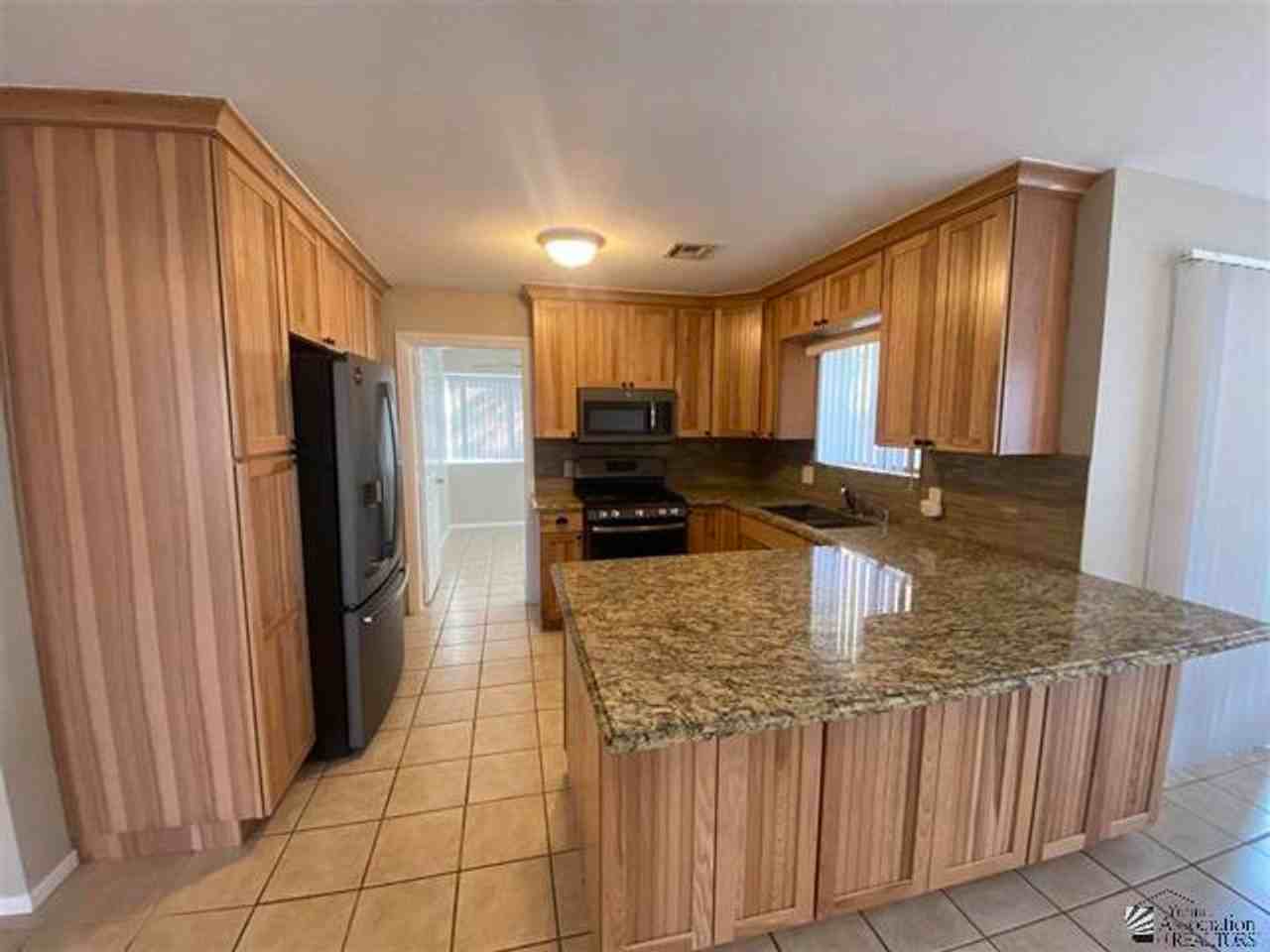 11281 E 27th St - Photo 3 of 20