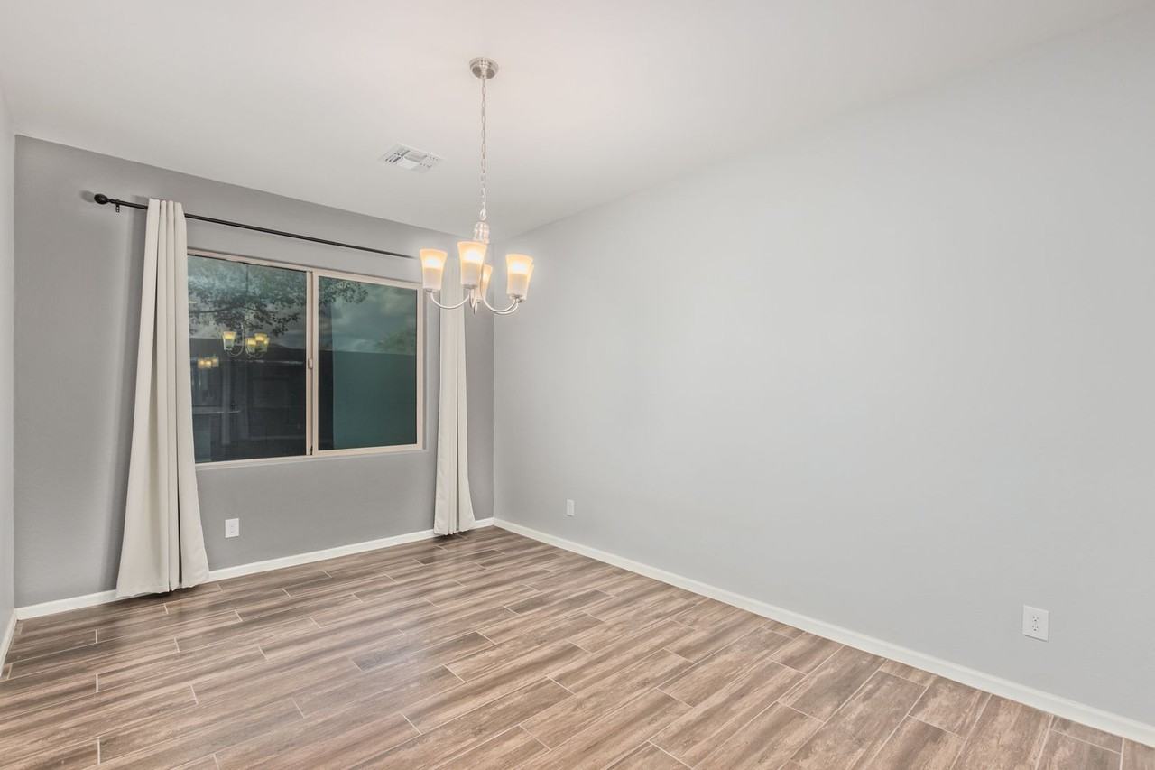 12158 W Desert Moon Way - Photo 7 of 29