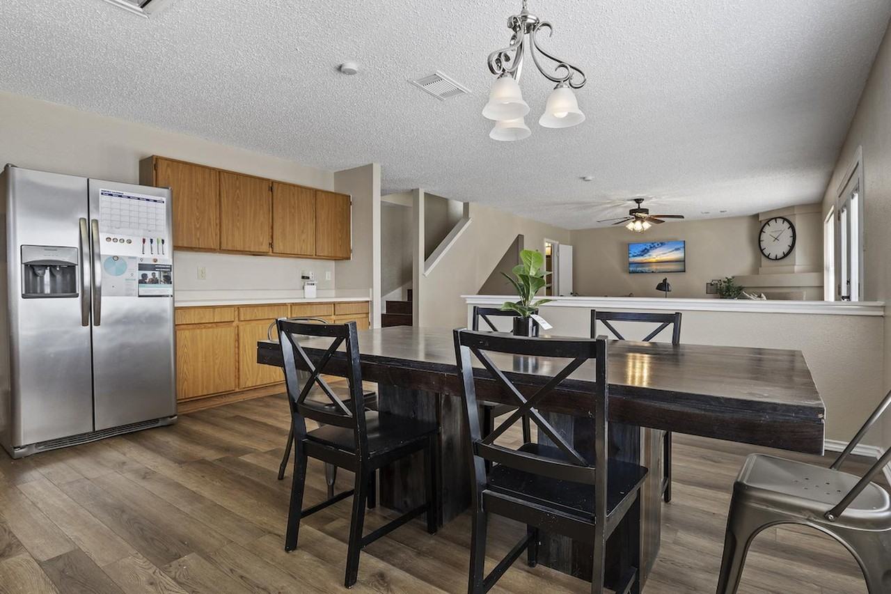 Charming Rue De Lis Home with Vaulted Ceilings & Fireplace - Photo 7 of 20