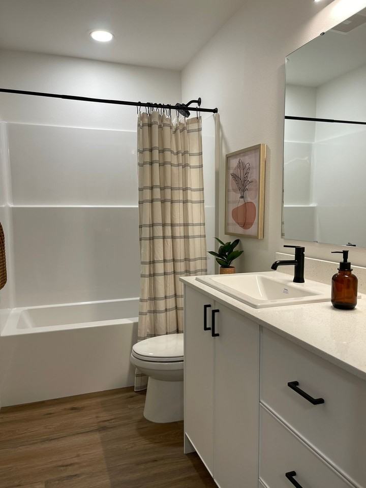 The Woodlands Townhomes - Photo 7 of 15