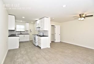 208 1/2 E Young Pl - Photo 1 of 1