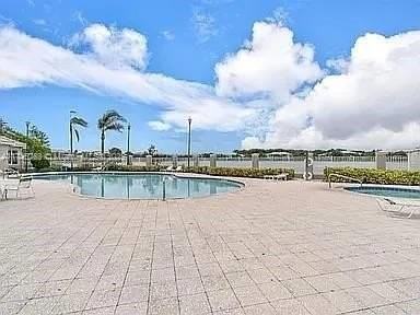 5001 Wiles Rd #101 - Photo 3 of 14