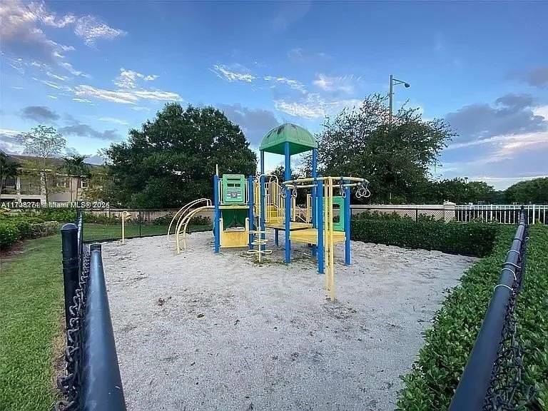 5001 Wiles Rd #101 - Photo 6 of 14