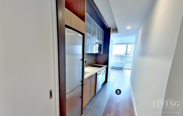 620 West 42nd Street - Photo 2 of 6