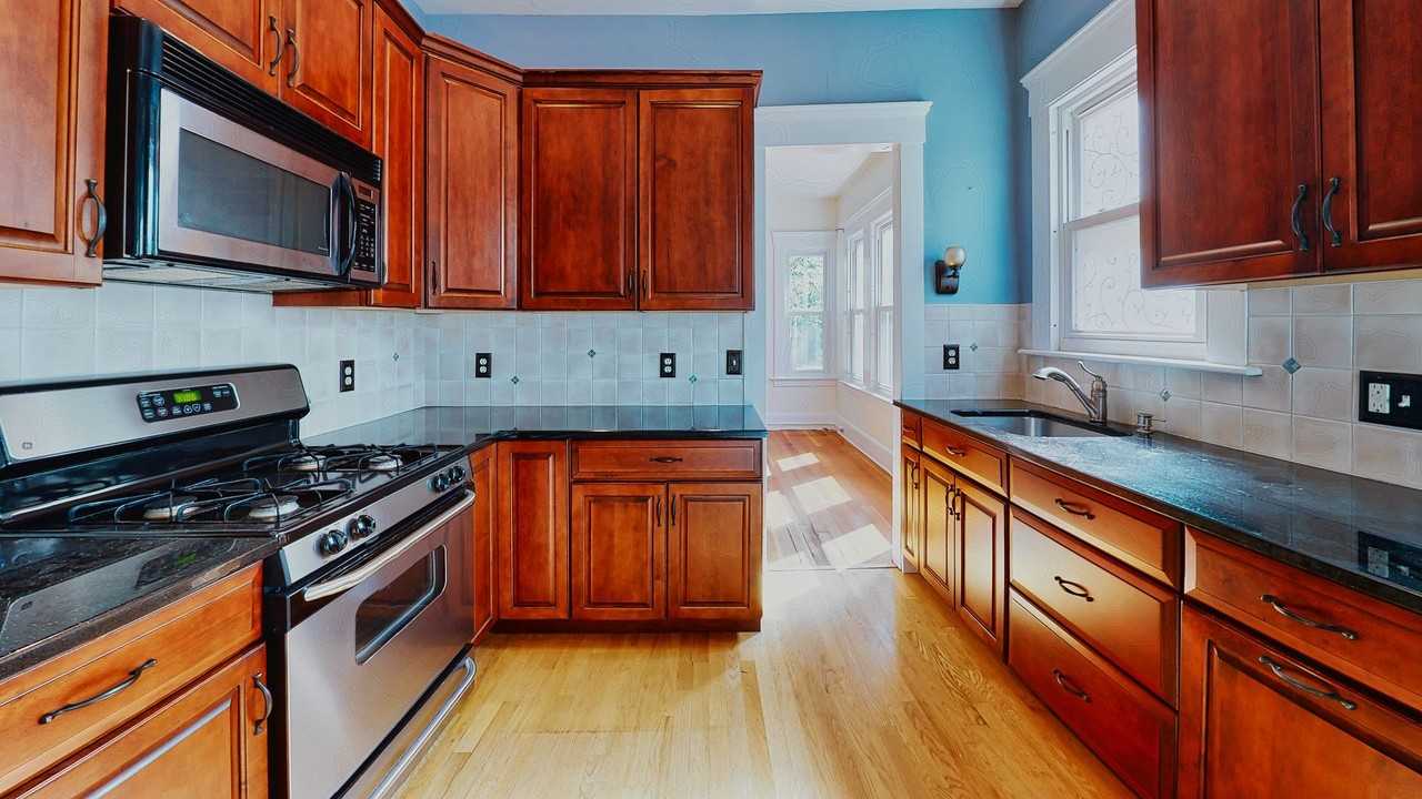 [In-Unit Laundry; Garden] Townhouse-Style Living, with Historical Details & Parking! - Photo 2 of 50