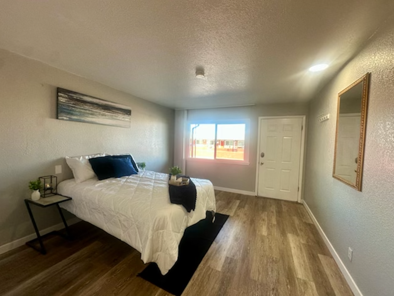 Clean, updated unit with utilities included - Photo 2 of 14