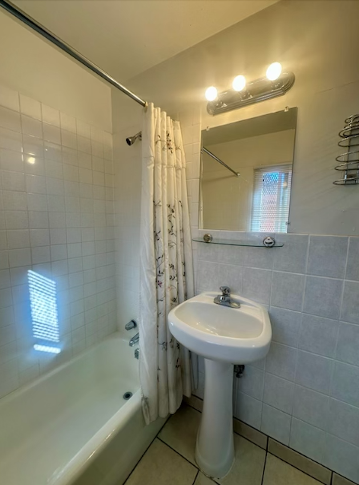 Clean, updated unit with utilities included - Photo 4 of 14