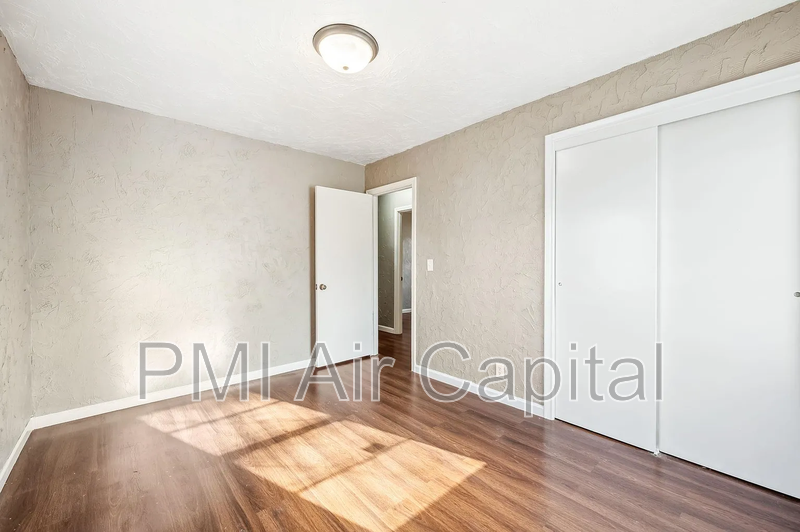 2325 S Hiram St - Photo 6 of 9