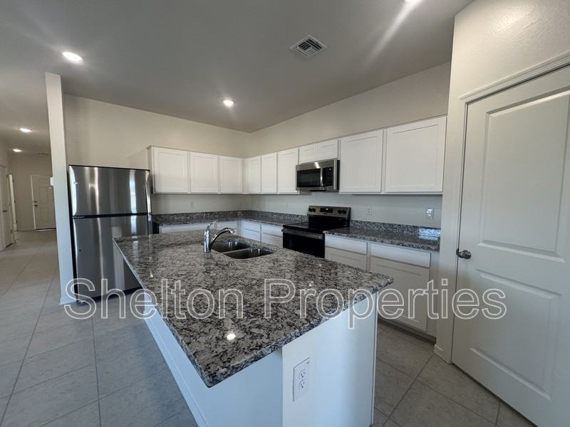 9712 W Odeum Ln - Photo 2 of 17