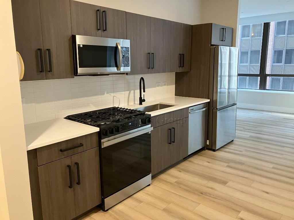 Wall St #879 - Photo 2 of 4