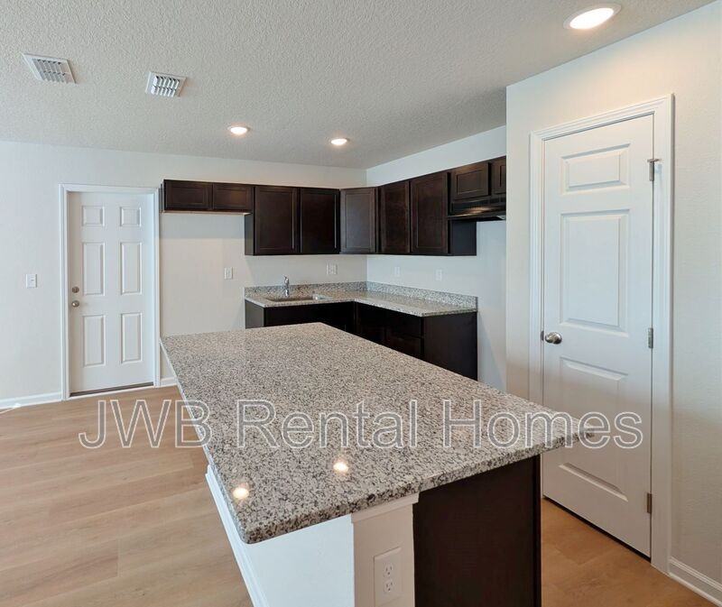 1305 E 3rd St - Photo 2 of 12