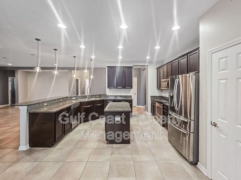 11228 77th St E - Photo 5 of 33