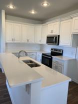Brand new open concept quartz countertops - Photo 1 of 1