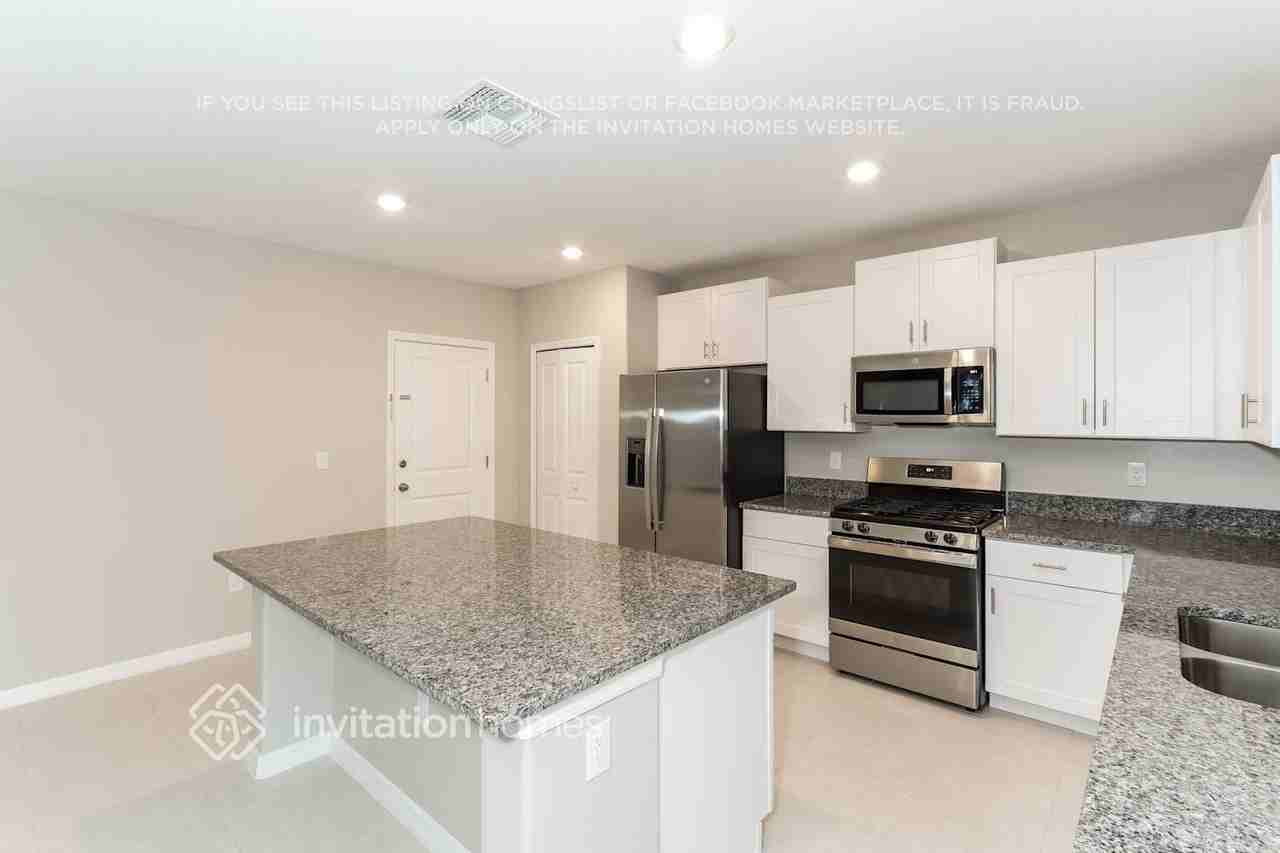 3808 86th St E - Photo 6 of 16