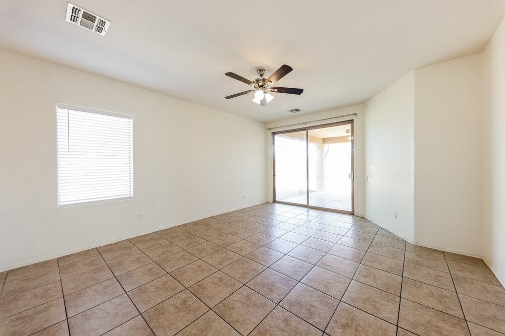 909 S 115th Dr - Photo 3 of 16