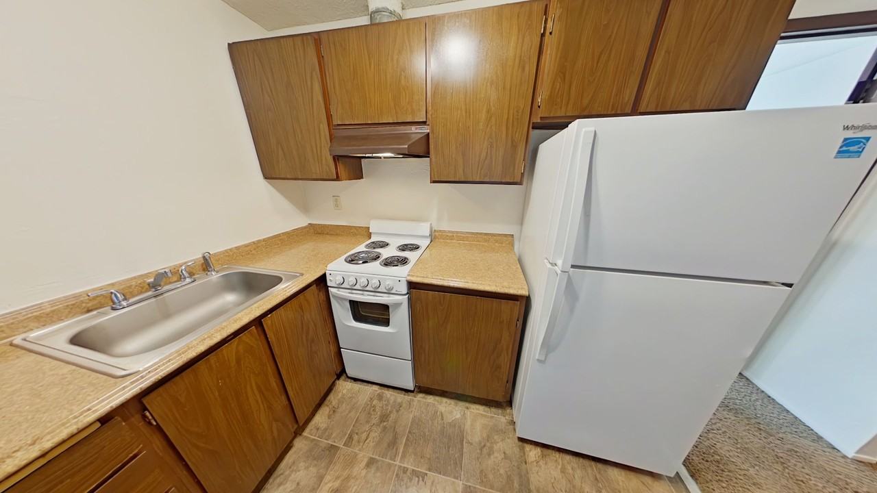 Hide-A-Way Apartments - Photo 2 of 14