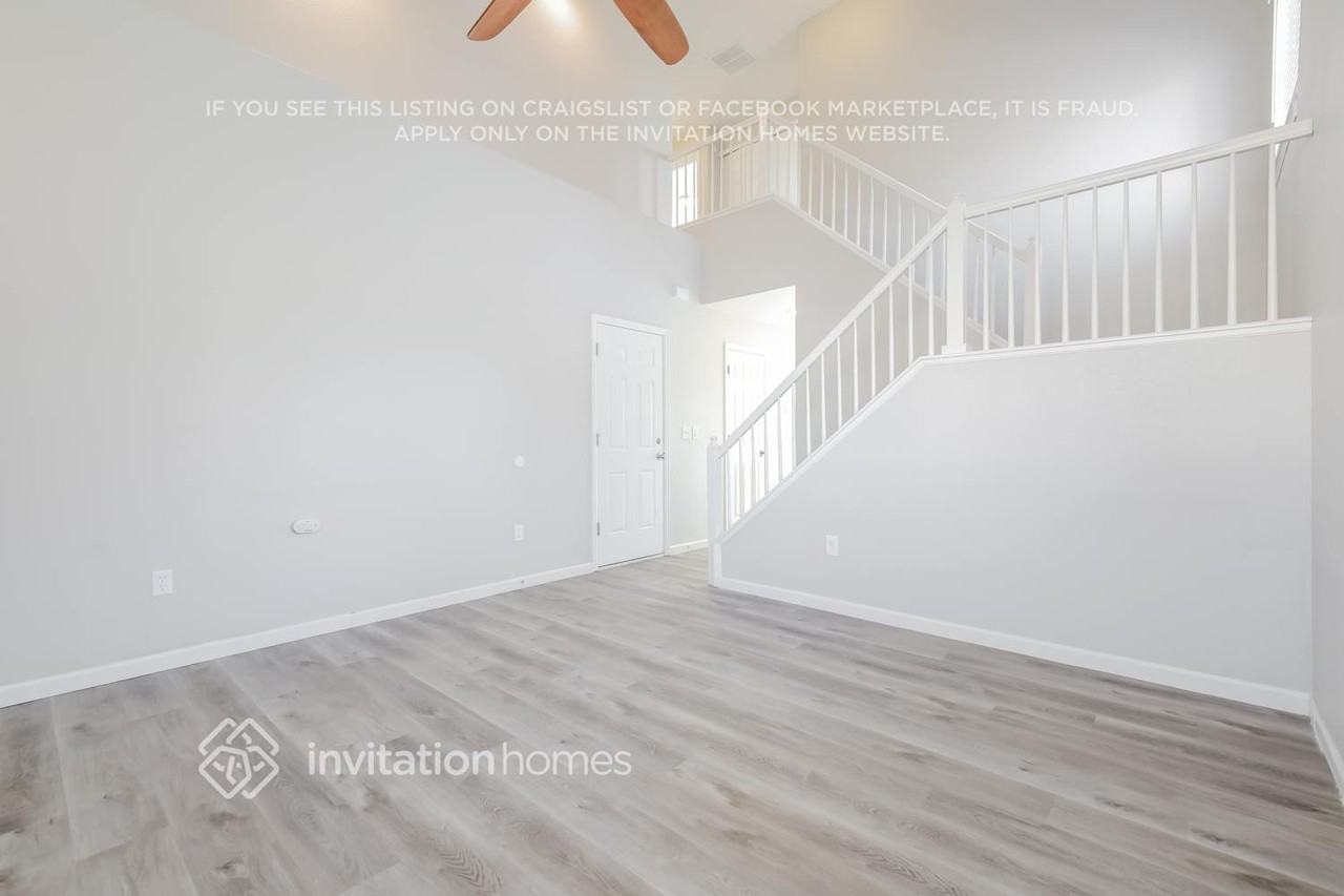 19398 E 58th Dr - Photo 4 of 18