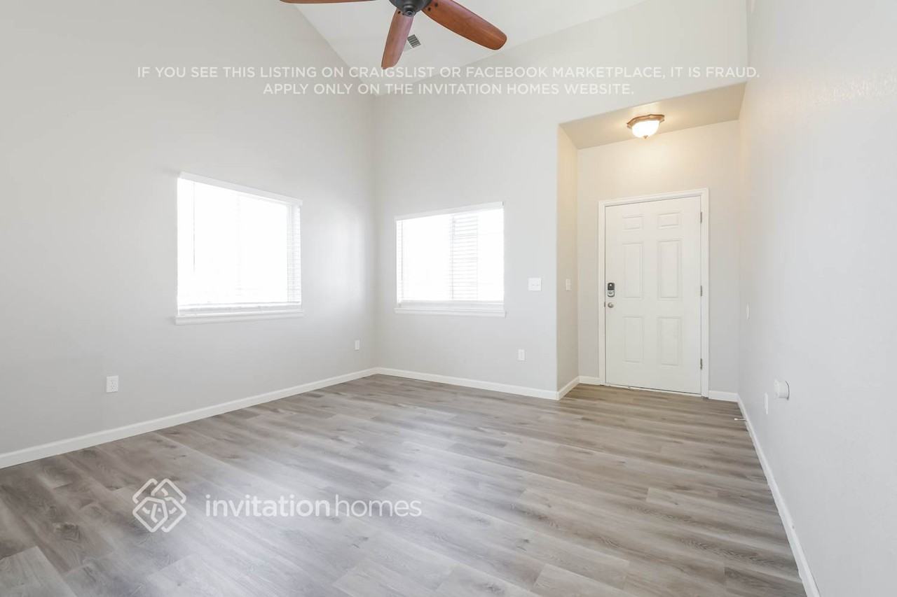 19398 E 58th Dr - Photo 5 of 18