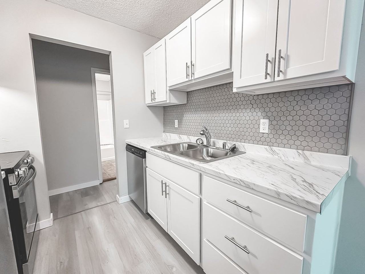 The Groves Apartments - Photo 2 of 50