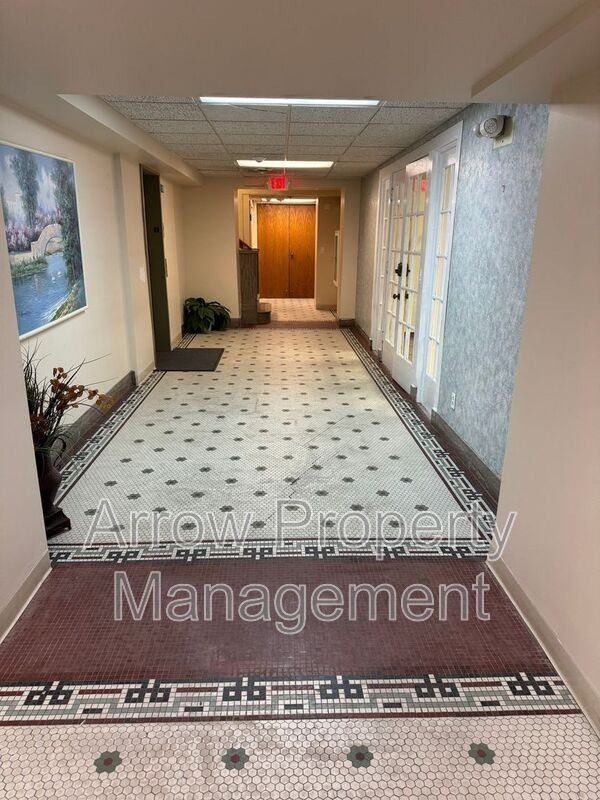 208 E 5th St - Photo 2 of 12