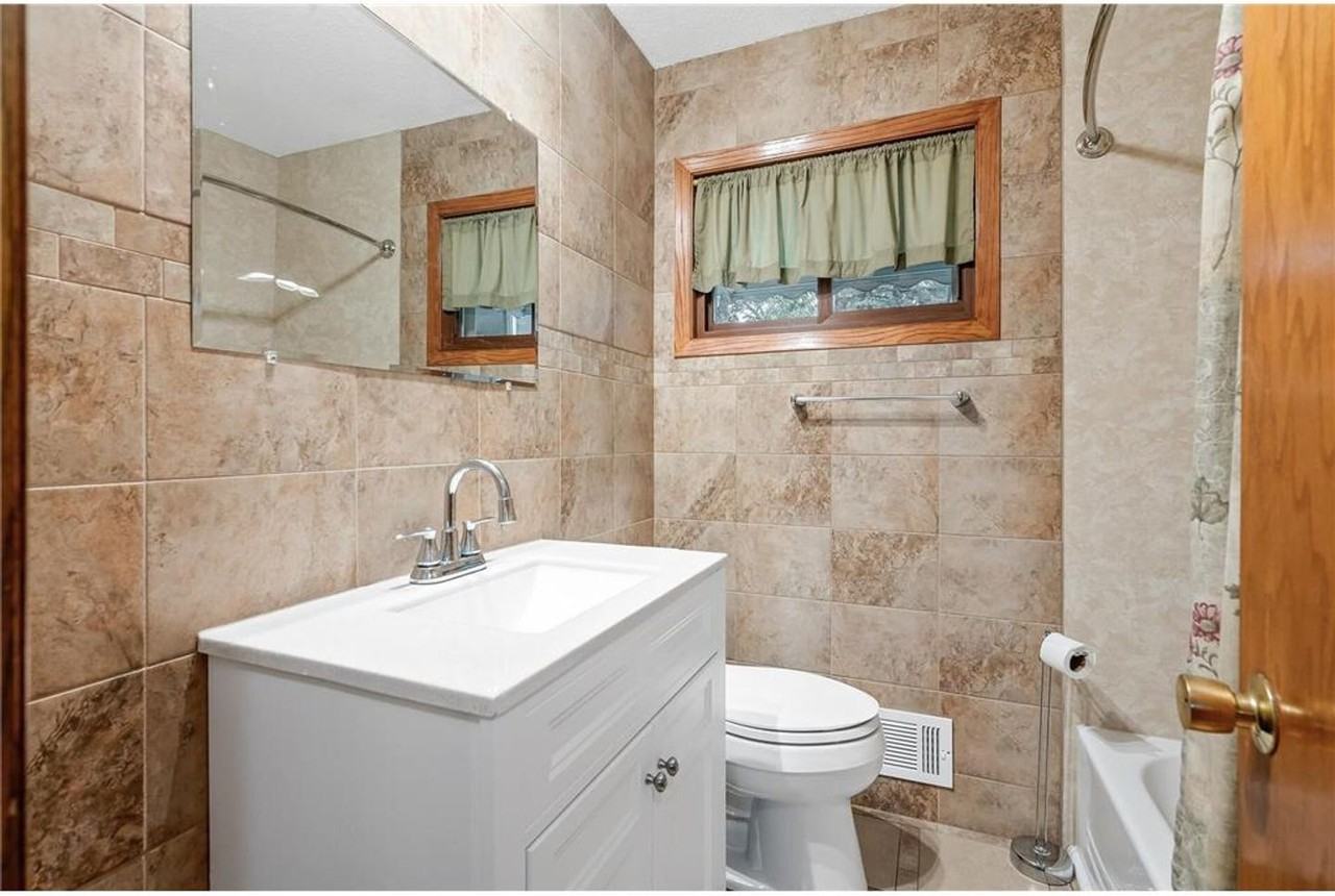 4613 Aquila Ave N - Photo 4 of 17