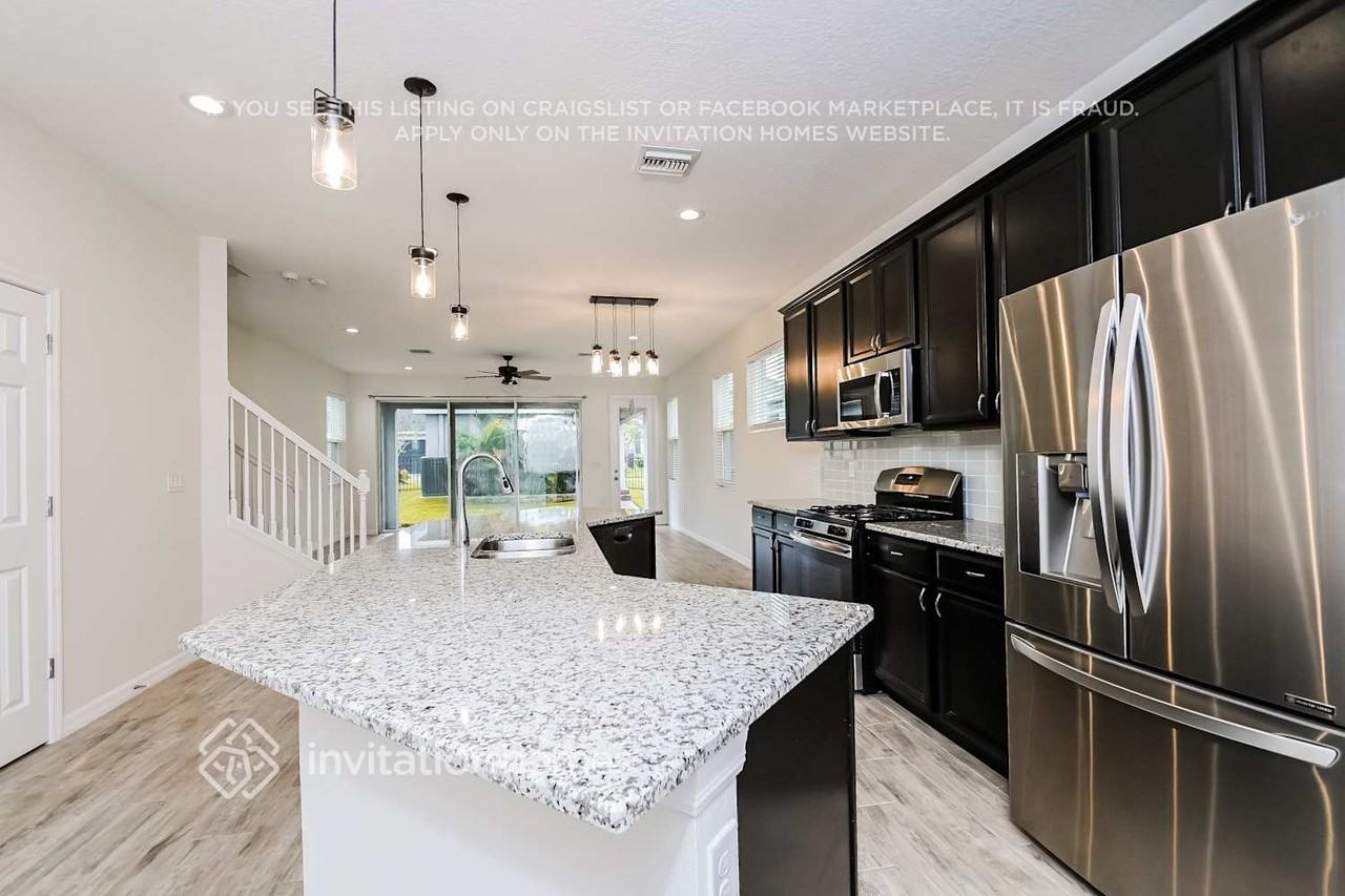 7115 Bowspirit Pl - Photo 3 of 16