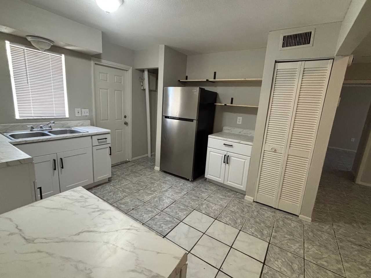 921 33rd Ave W - Photo 3 of 16