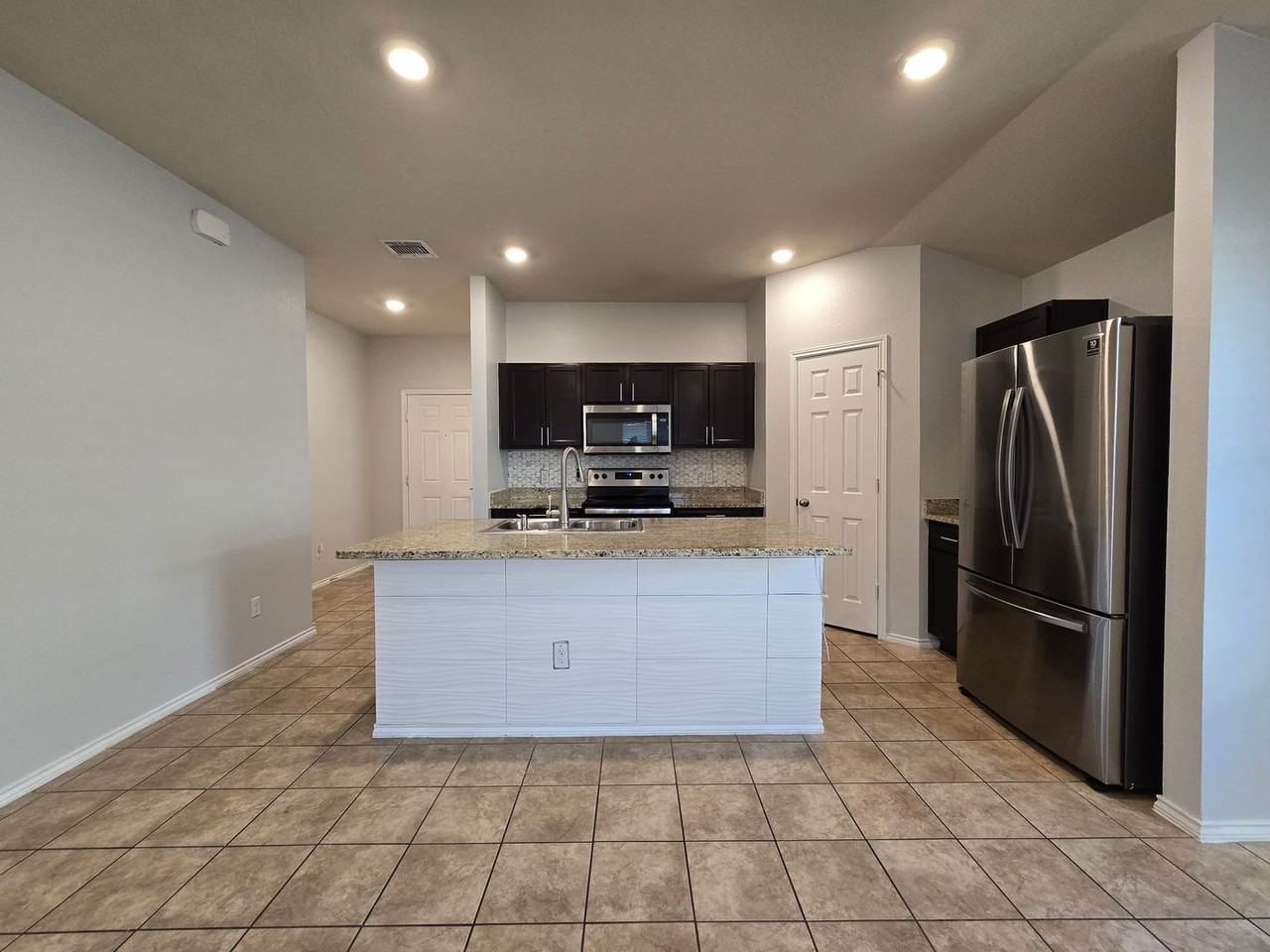 6009 Sally Ride Ln - Photo 3 of 21