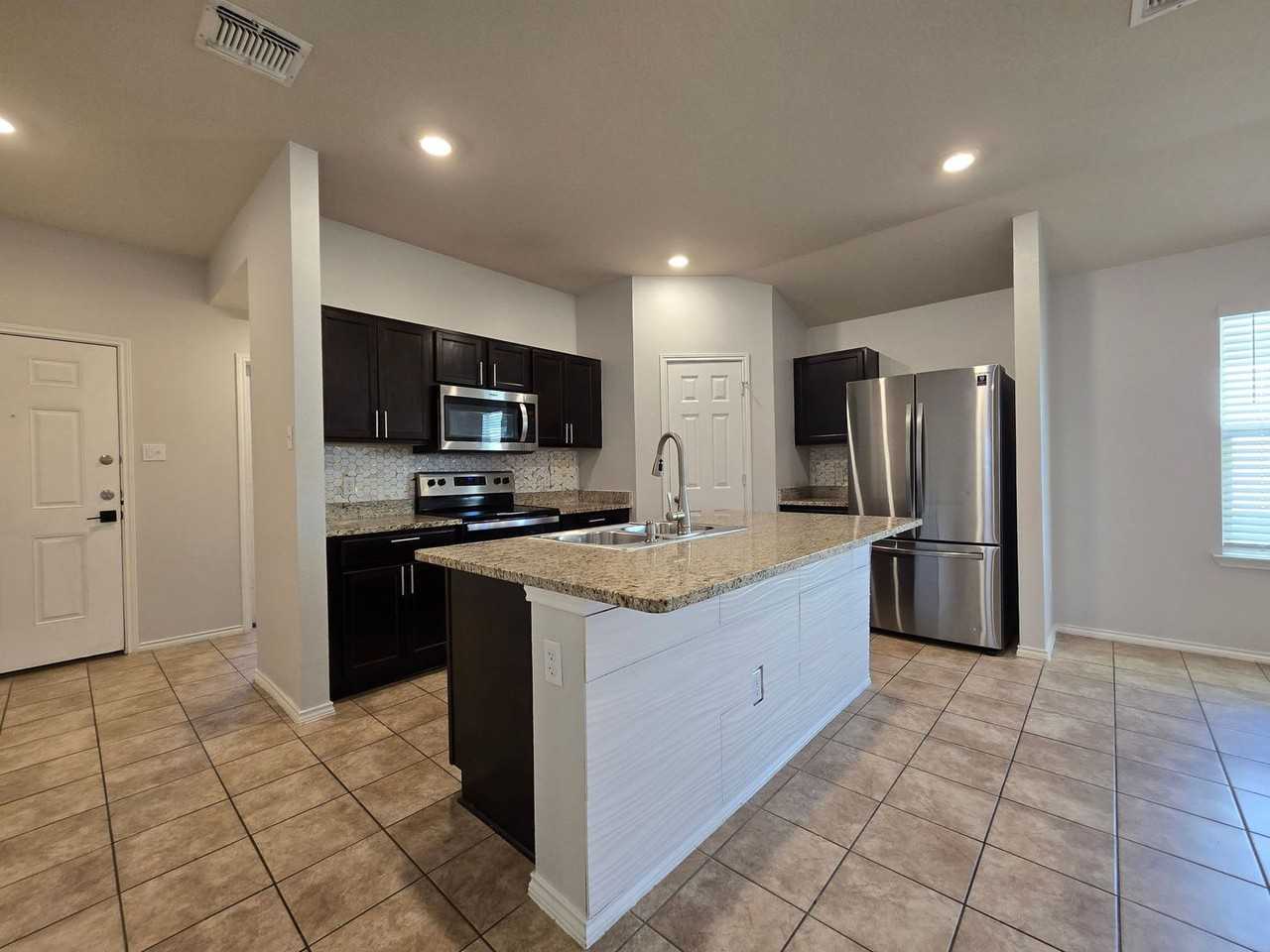 6009 Sally Ride Ln - Photo 4 of 21