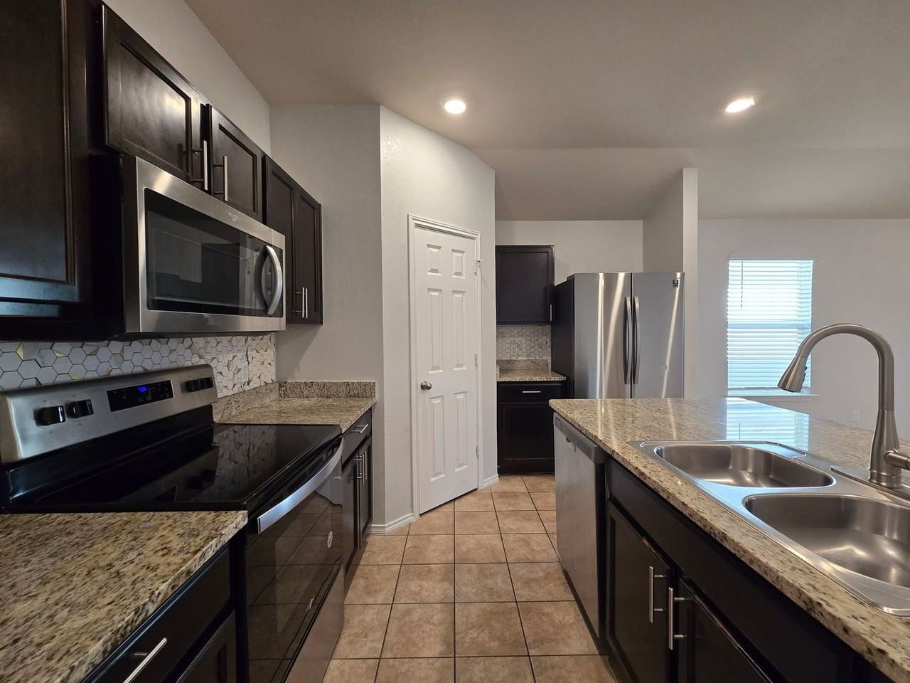 6009 Sally Ride Ln - Photo 6 of 21