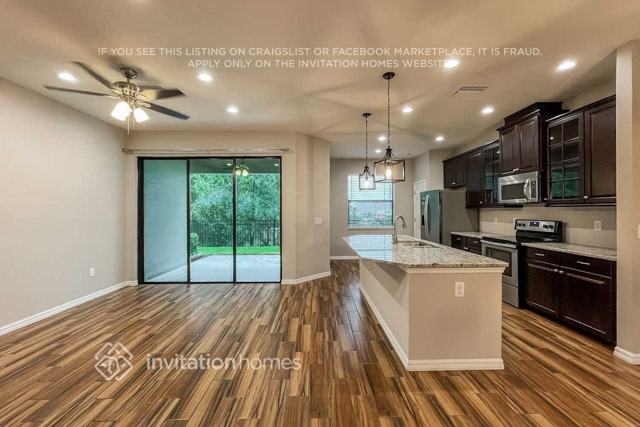 4948 Wandering Way - Photo 3 of 14