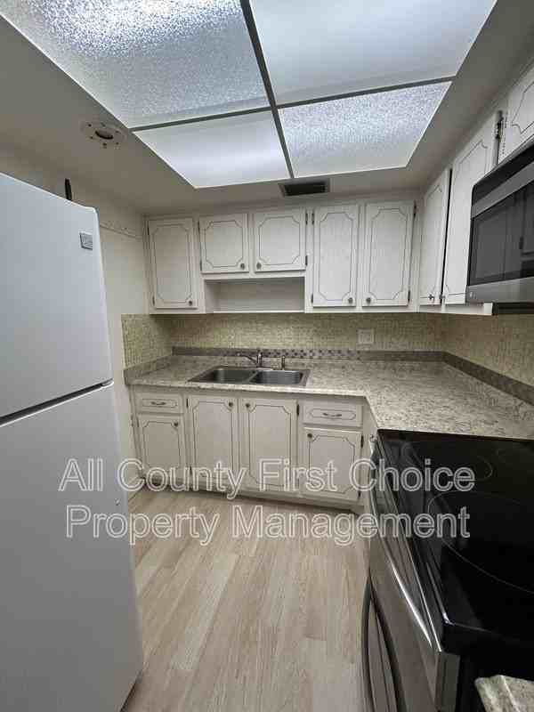 951 79th Ave N #322 - Photo 2 of 13