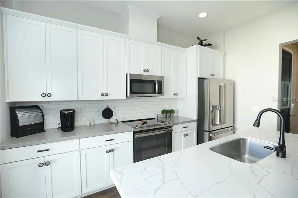 8451 Karrer Ter #8451 - Photo 3 of 35