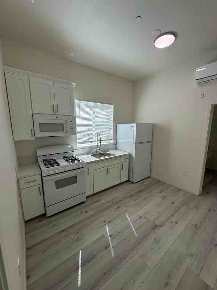 1120 E 25th St. (Restricted Property ALL UNITS) - Photo 7 of 12