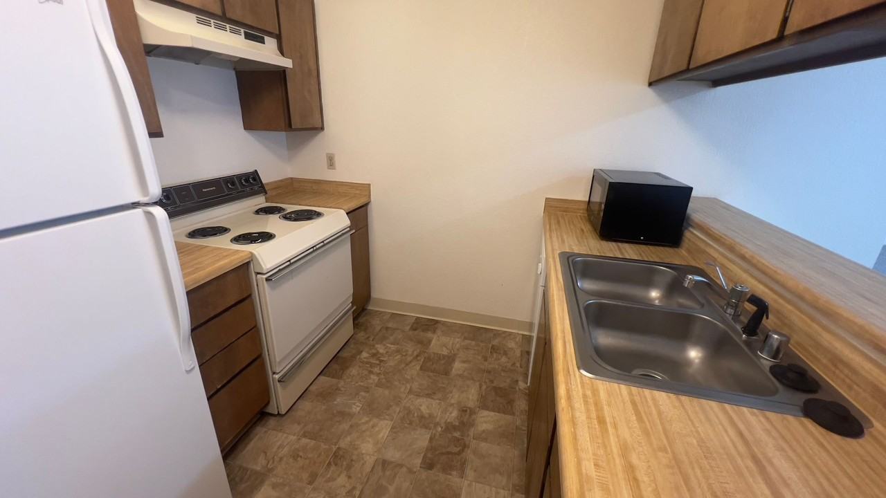 Thoma Holcomb Apartments - Photo 2 of 12