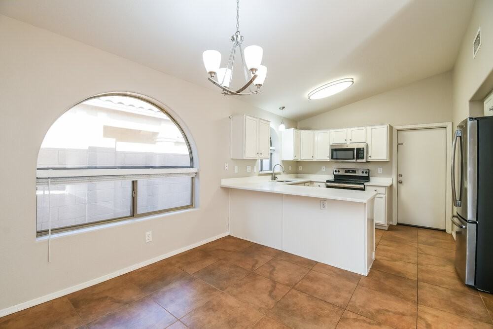 9909 E Onza Ave - Photo 6 of 16