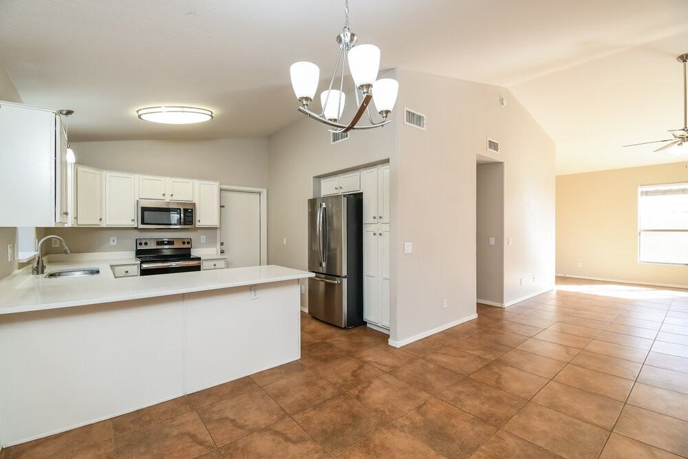 9909 E Onza Ave - Photo 7 of 16