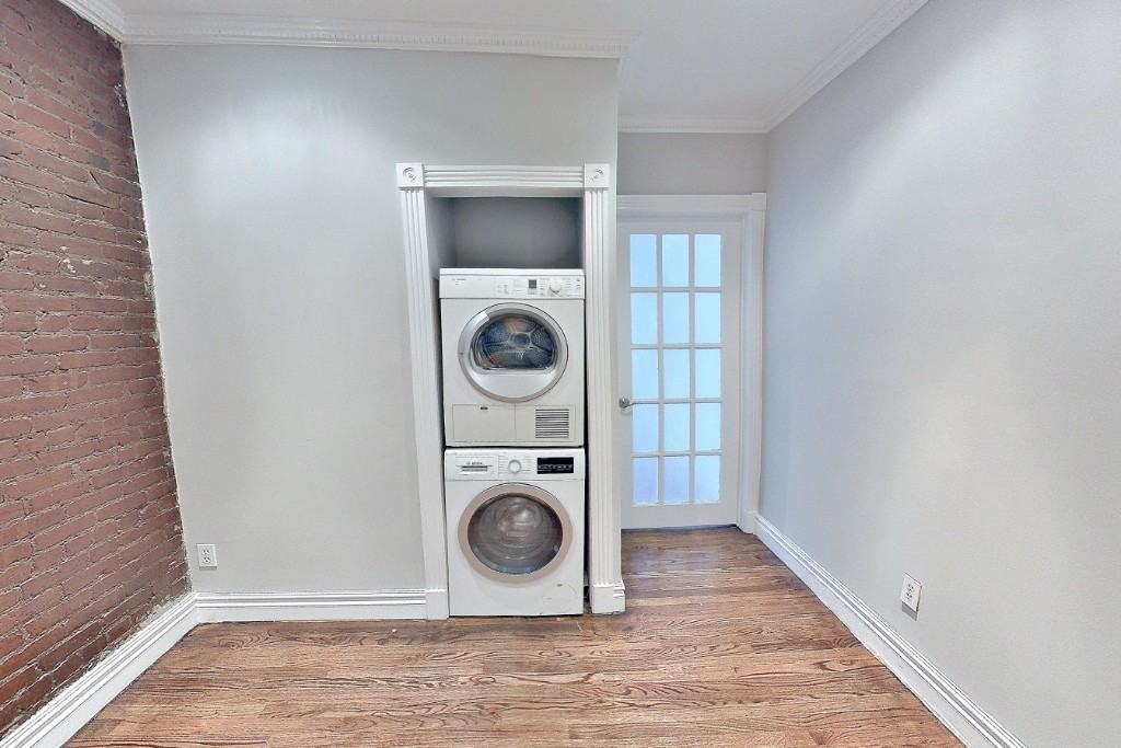 E 23rd St #1 - Photo 3 of 6