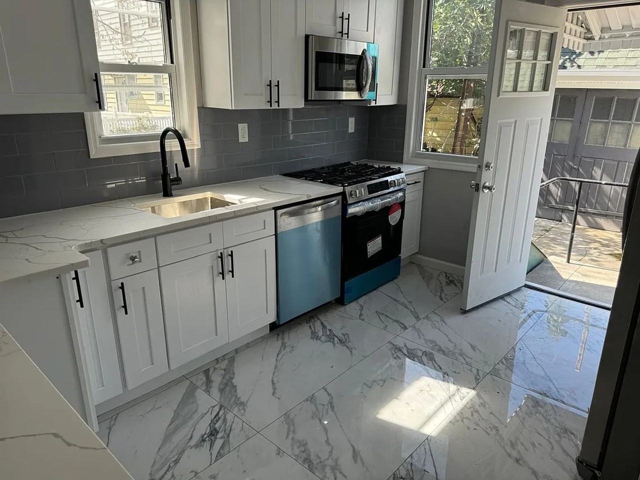 11416 97AV E 104th St, Ozone Park, NY 11416 - Photo 2 of 9