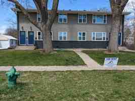 featured image of 405 E 6th St