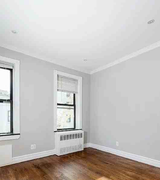 213 E 26th St #3B - Photo 2 of 5