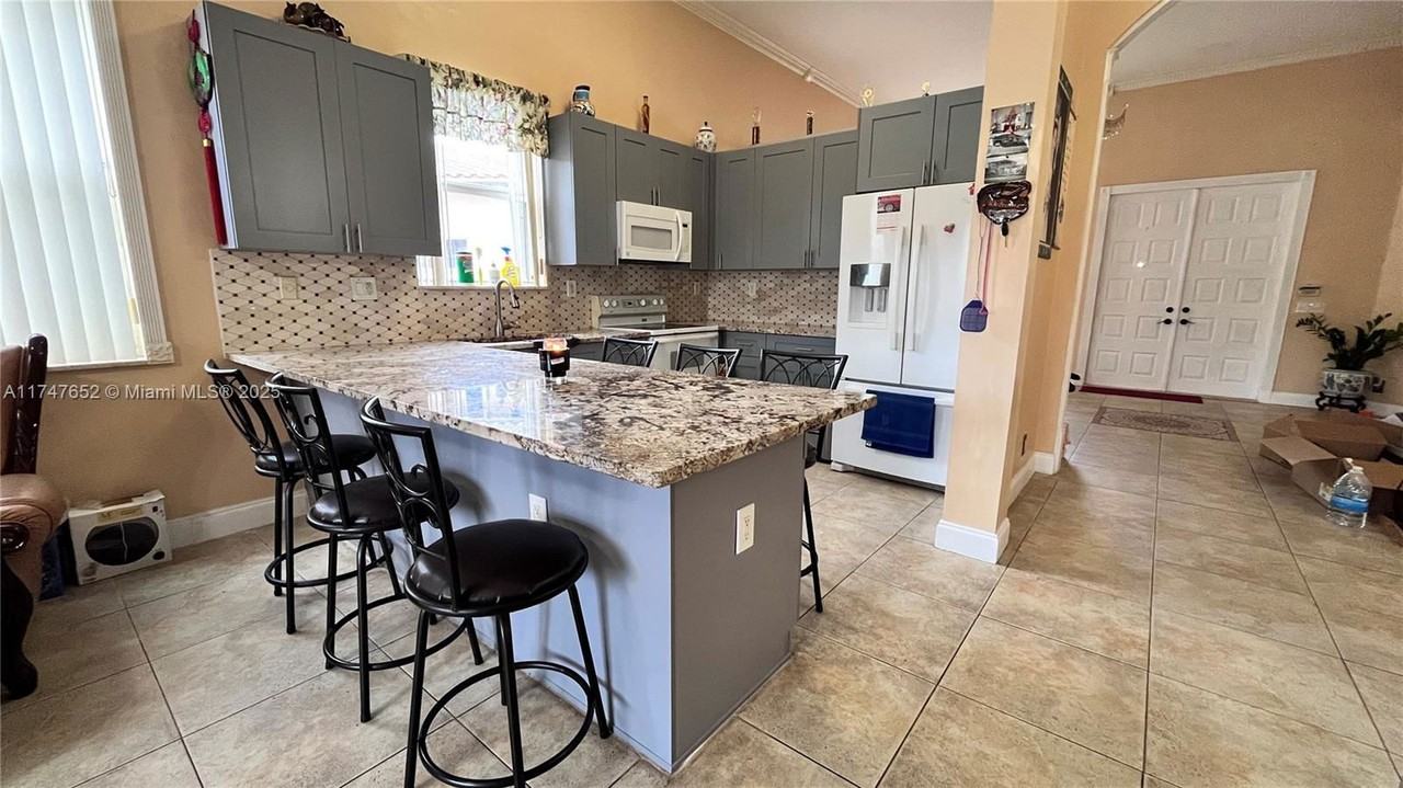 13296 Sw 54th Ct - Photo 2 of 8