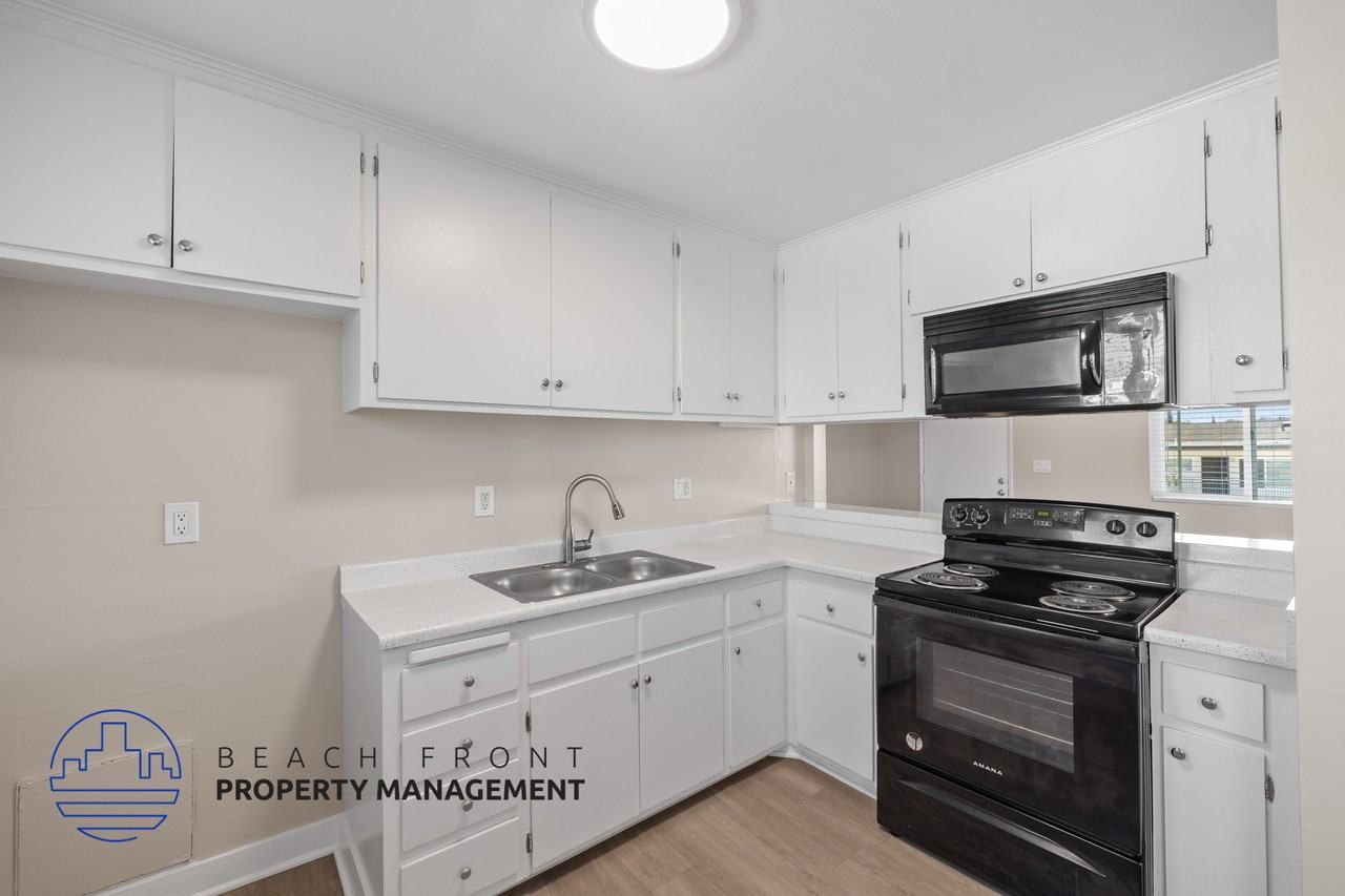 Premier Apartments - Photo 3 of 33