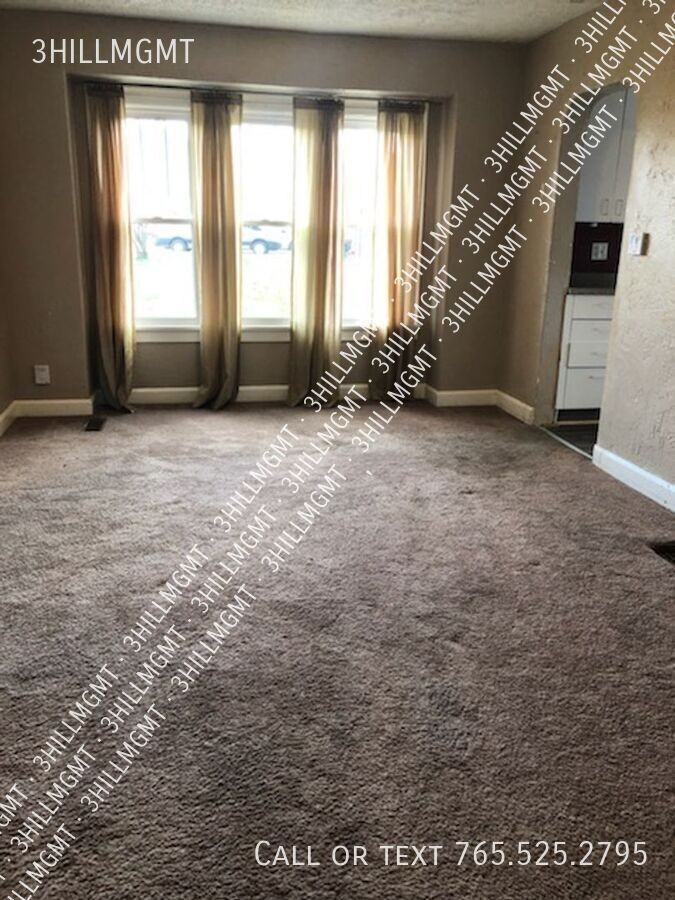 1218 S Bloomington St - Photo 3 of 17