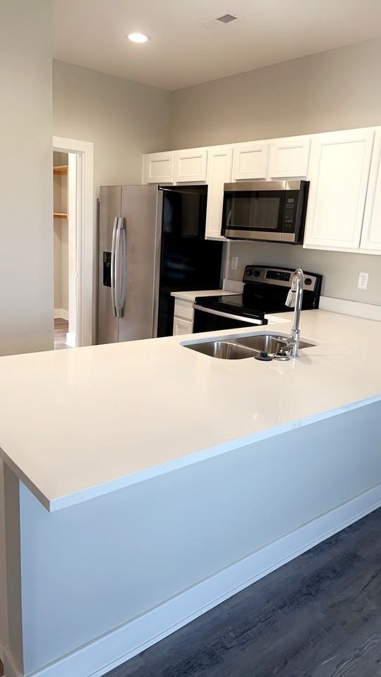 Doyon Properties - Photo 6 of 16