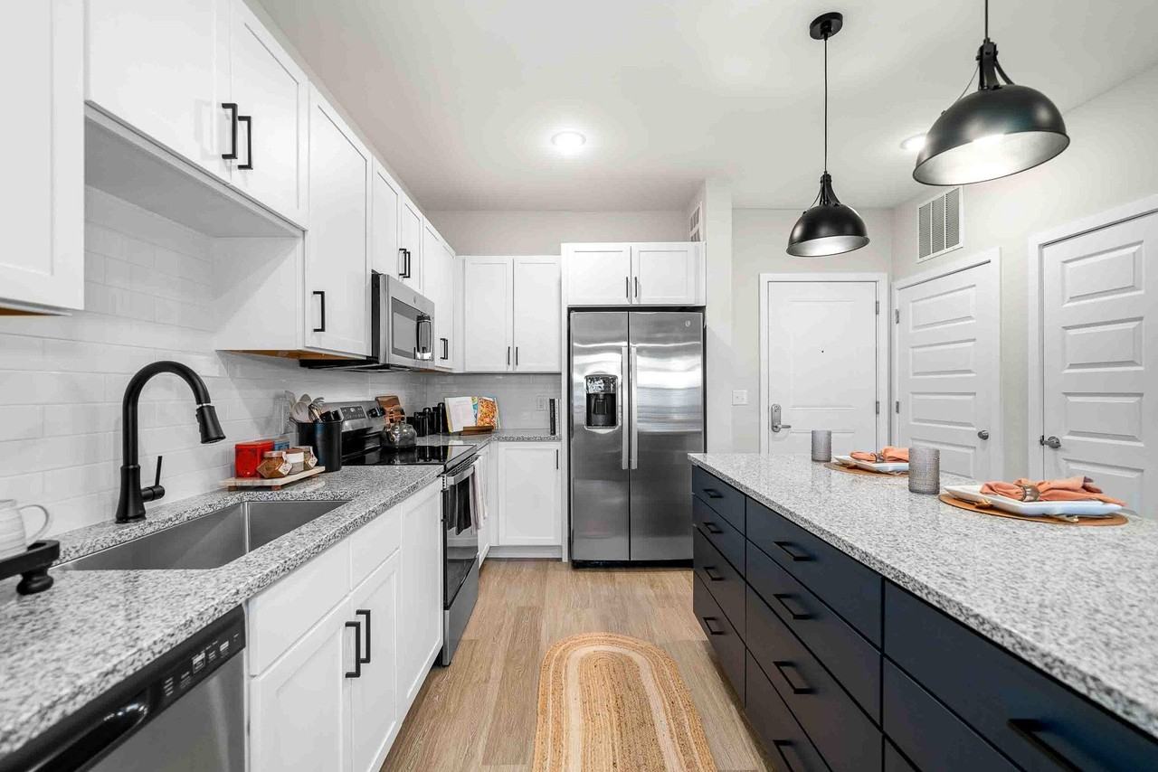 The Refinery at Sugar Hill Apartments and Townhomes - Photo 7 of 29