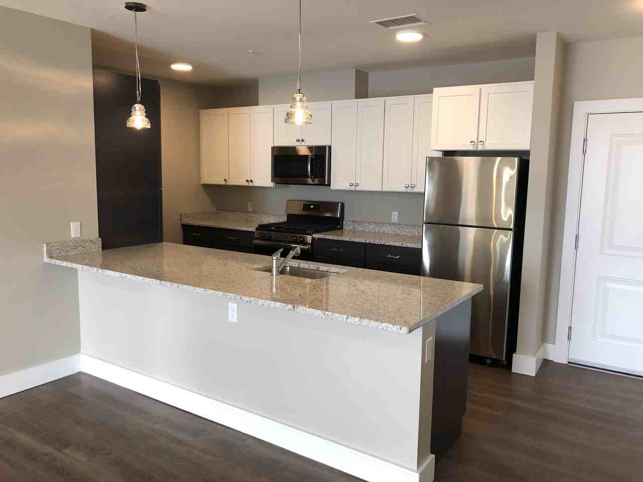 River Rock Residences - Photo 5 of 33